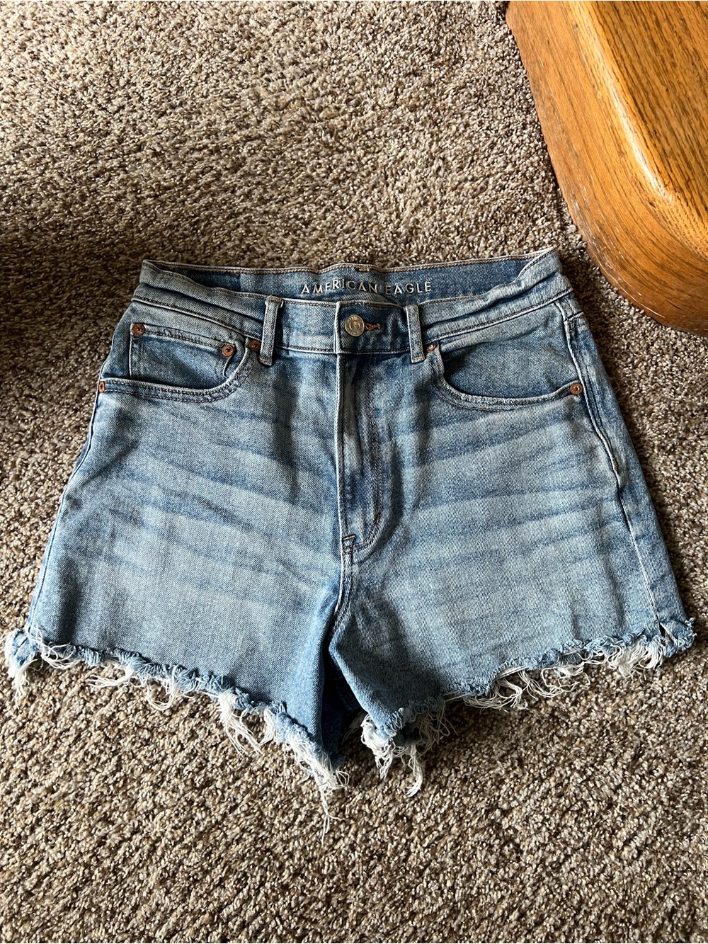 American Eagle Outfitters Light Wash Denim High-Rise Frayed Hem Shorts